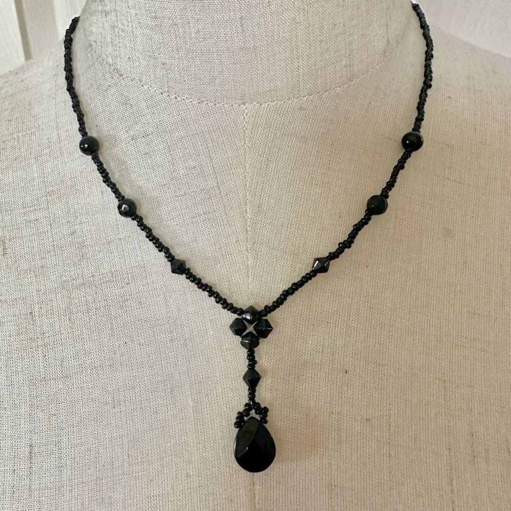 Black beaded teardrop pendant necklace